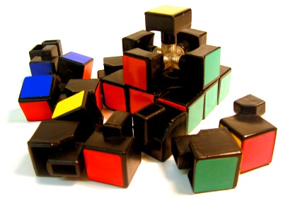 disassembled rubiks cube pieces