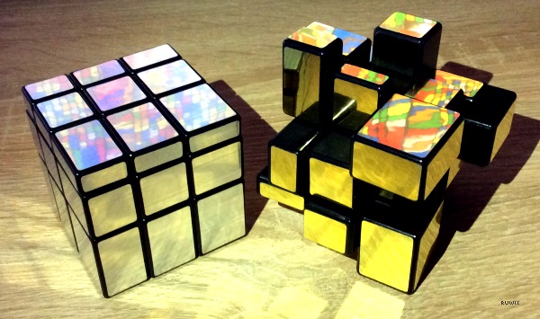 solved and scrambled mirror cube puzzle